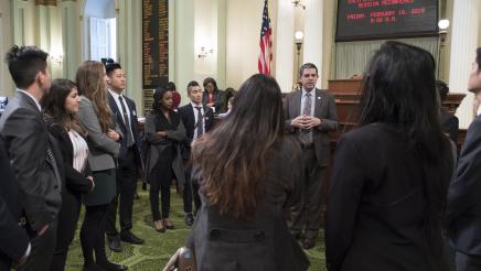 Assemblymember Wood Visits with Dental Students on the Assembly Floor