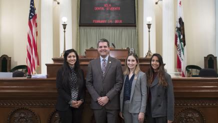 Assemblymember Wood with UCLA Dental Students on Assembly Floor - Close Up