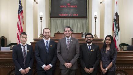 Assemblymember Wood with USC Dental Students on Assembly Floor - Close Up